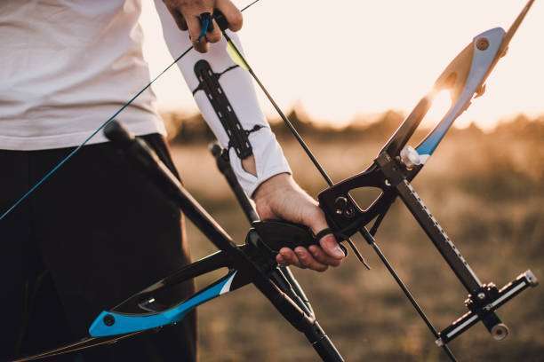 practicing archery with compound bow
